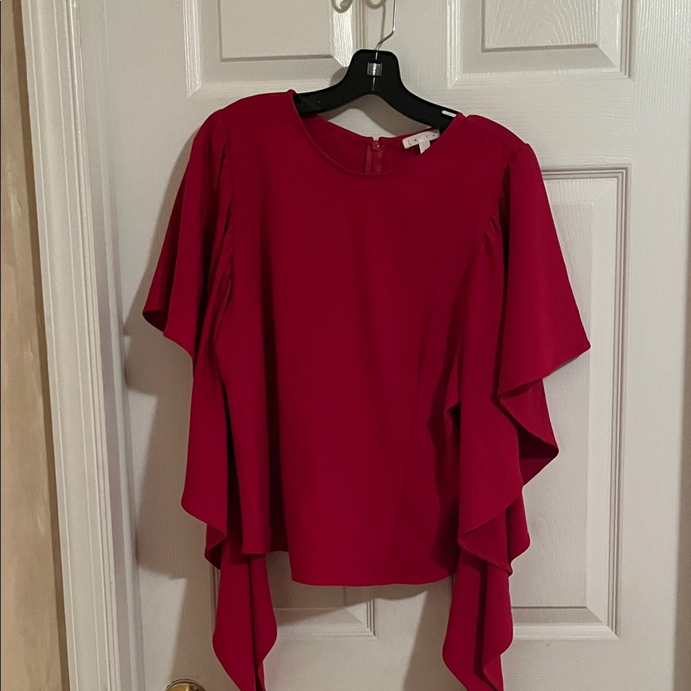 Fuchsia, dramatic sleeve blouse. Size large.